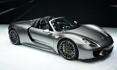 going green? Porsche 918 hybrid beats Toyota Prius